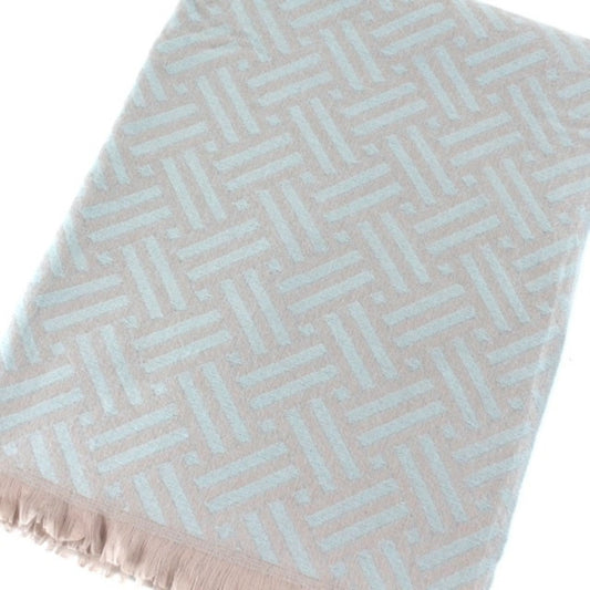 Blue patterned reversible scarf, folded to show both sides