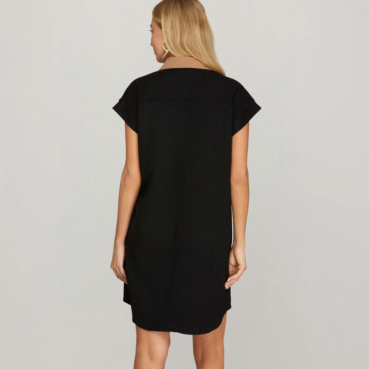 Black suede shirt dress with short sleeves, back view