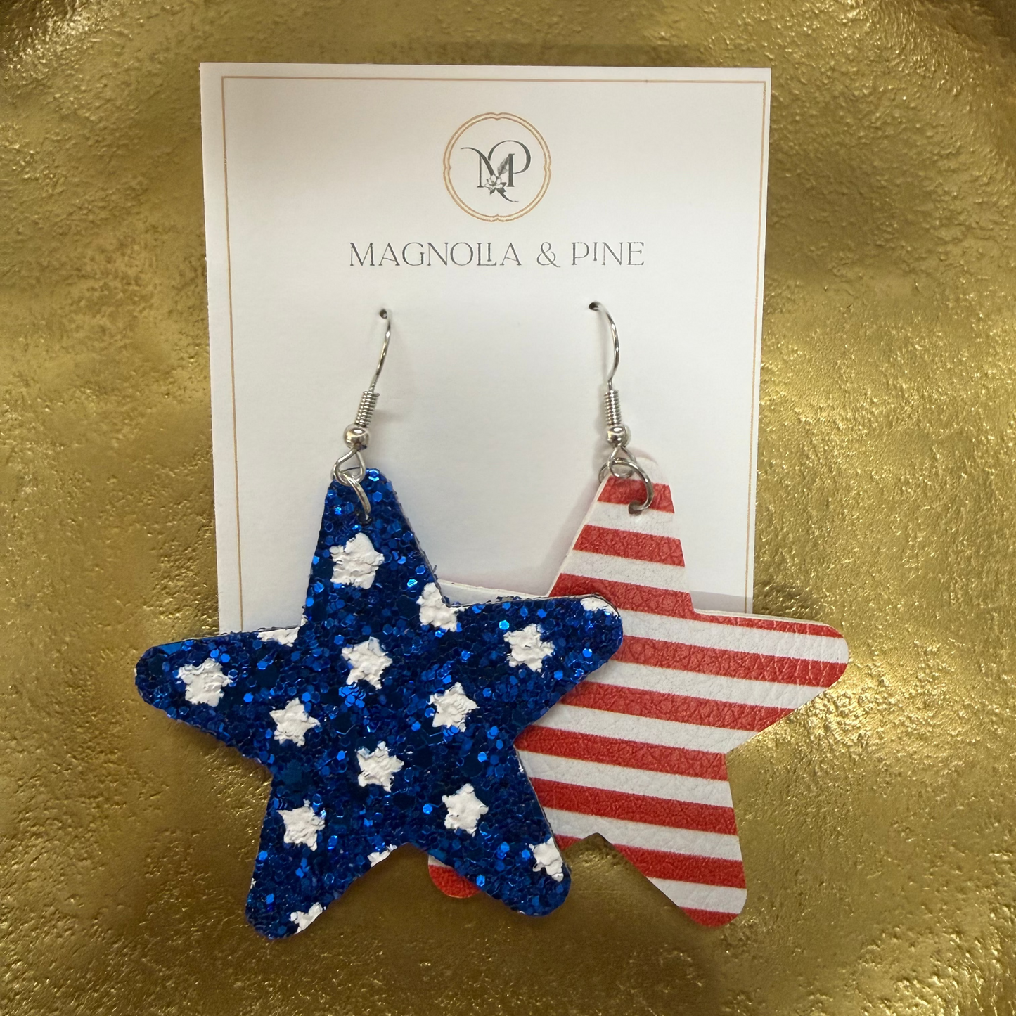 Glitter star-shaped earrings, additional view.