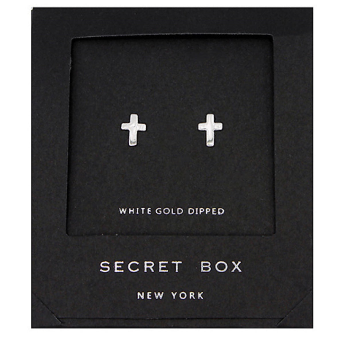 A pair of small silver-tone cross stud earrings displayed in a black gift box.