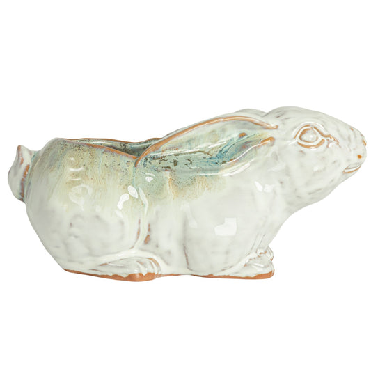Blue and white reactive-glaze stoneware rabbit planter, side view