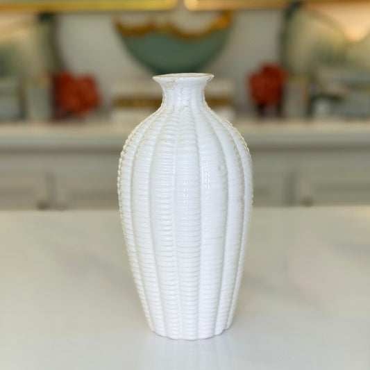 Tall white textured bud vase with ribbed texture