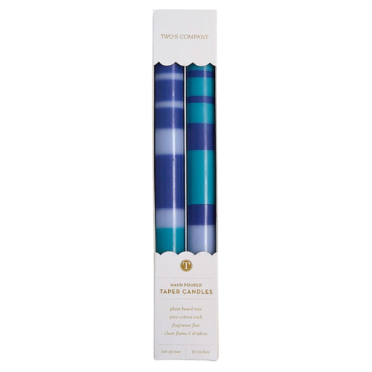 A boxed set of two navy and teal striped taper candles, 10 inches tall, labeled Hand Poured Taper Candles