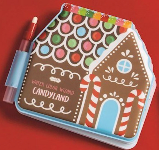 A gingerbread house-shaped 'Candyland' Water Color Wizard book cover with an attached brush, on a red background.
