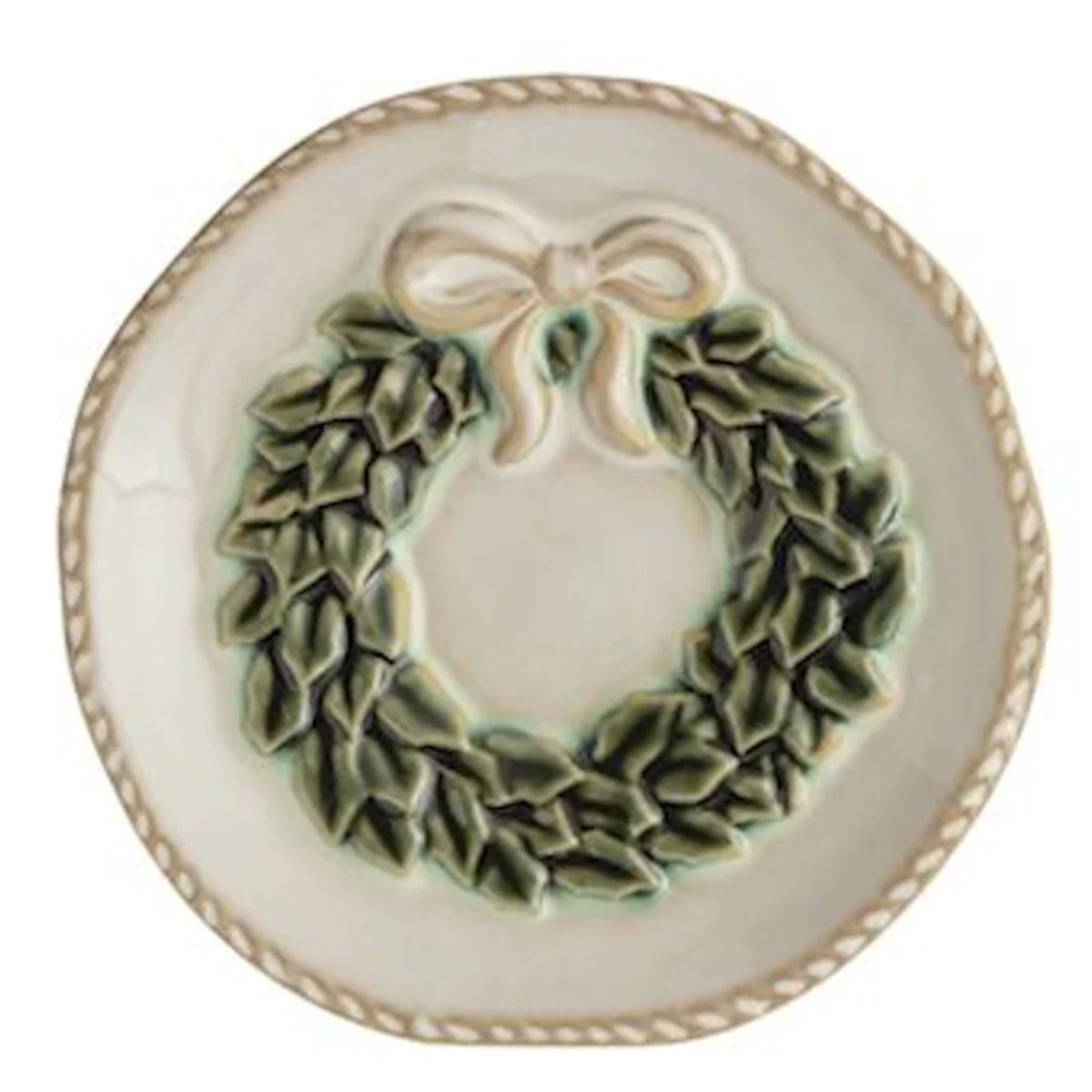 A round cream ceramic dish embossed with a holiday wreath and bow design, with a rope-twist rim.