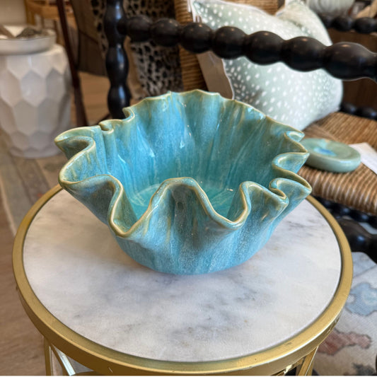 Handmade ceramic bowl with a ruffled edge in a blue-green drip glaze