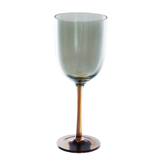 A single stemless wine glass with a translucent smoky gray-green bowl and a warm amber-brown stem and base, shown on a plain white background.