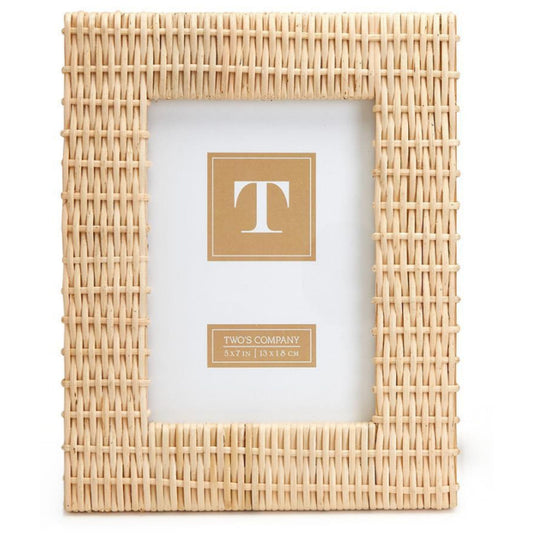 A criss-cross woven rattan photo frame in a natural finish and smaller size, shown front-facing with a blank white insert.