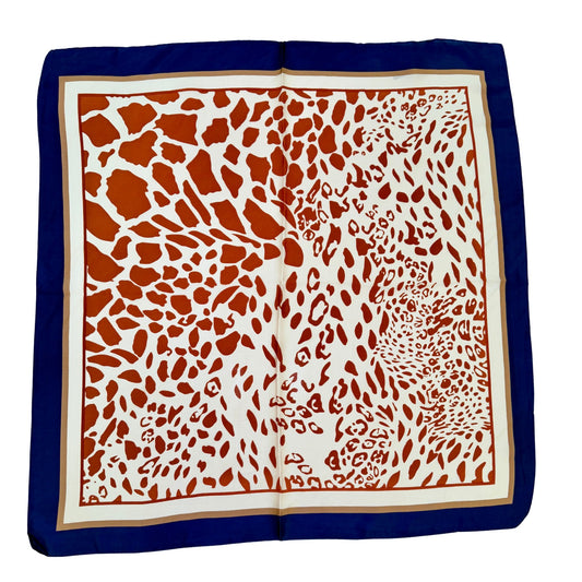 Animal Print Scarf with giraffe pattern, close-up detail
