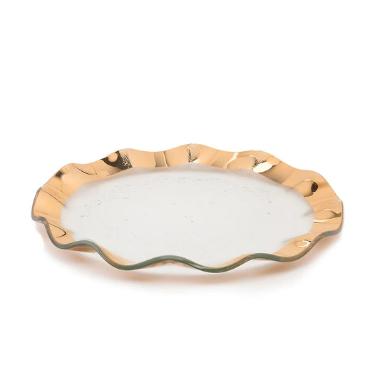 Ruffled glass dinner plate with a scalloped edge and metallic gold rim