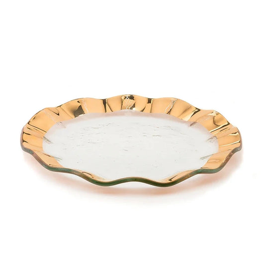 Gold-rimmed white dish on a white background