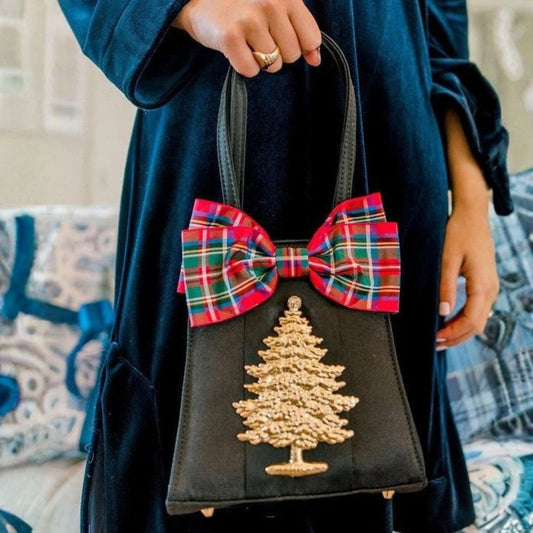 A black tree-shaped novelty purse in faille and matte satin with brass feet.