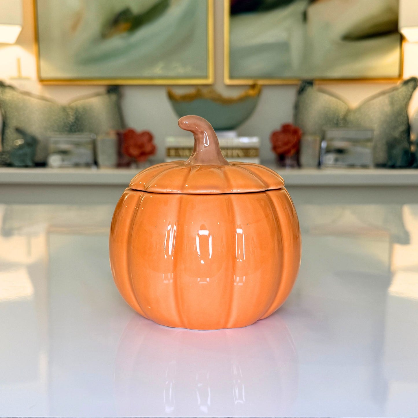 Ceramic pumpkin jar with lid removed, showing interior
