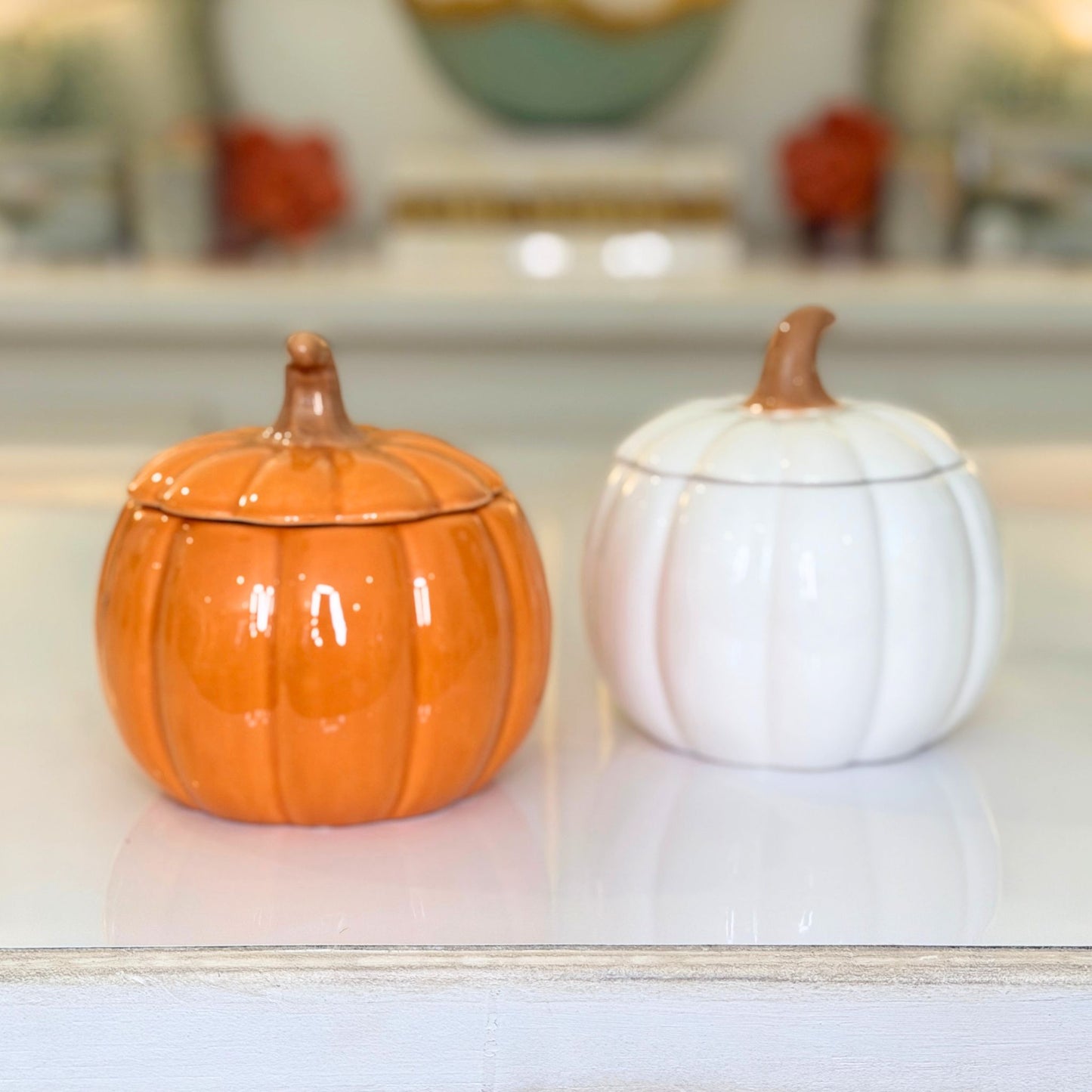 Orange glazed ceramic pumpkin jar with lid