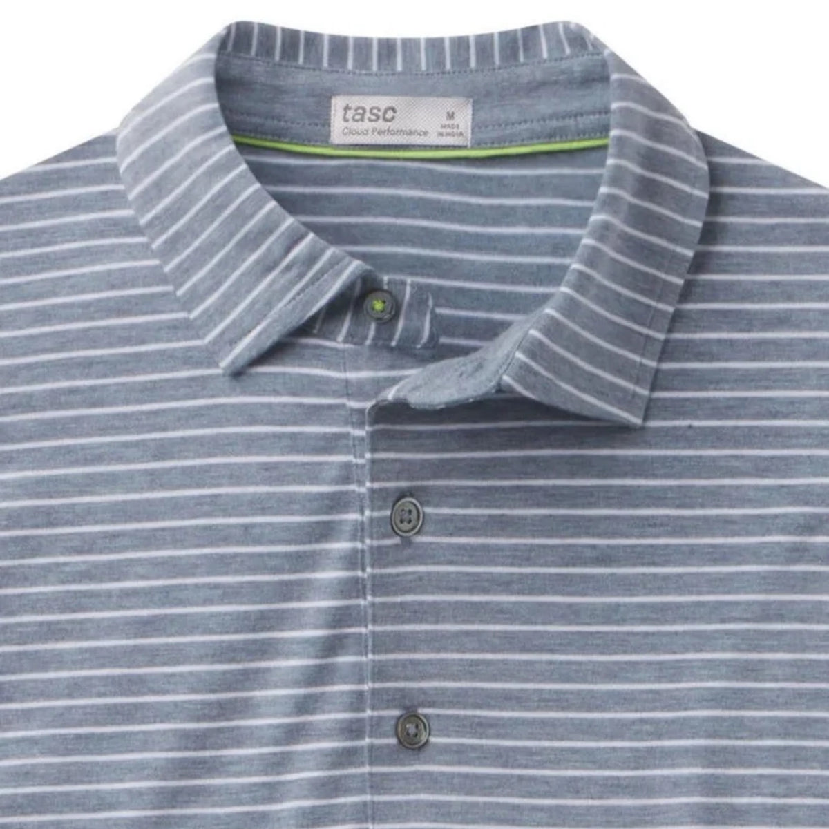 Close-up of the striped pattern and embroidered Lake Martin logo on the polo's chest.