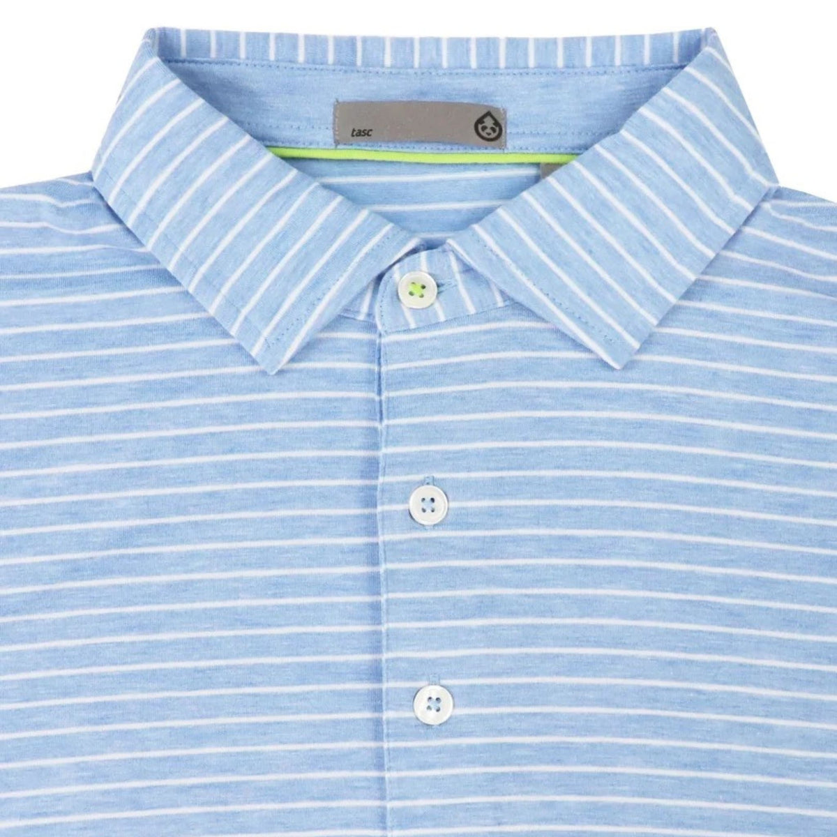 Close-up of the Brookline Stripe pattern and embroidered Lake Martin logo on the polo's chest.