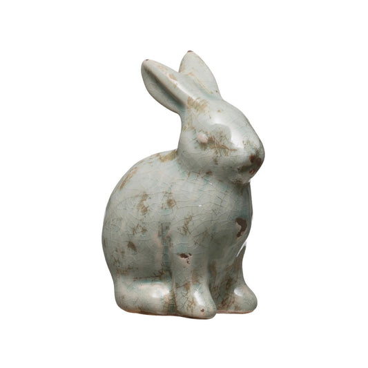Crackle-glaze terracotta rabbit figurine, side view showing the textured glaze
