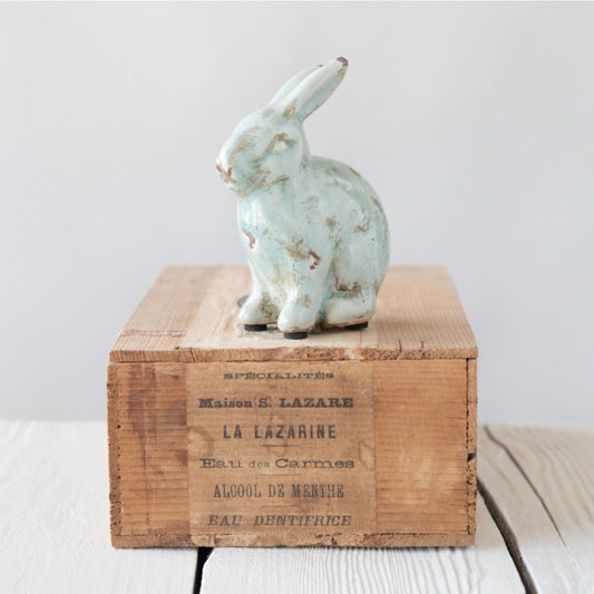 Crackle-glaze terracotta rabbit figurine with a distressed, collected-over-time finish
