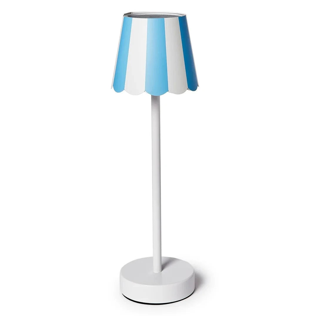 A modern table lamp with a white and light blue striped conical shade, a slim white stem, and a round white base, shown on a plain white background.