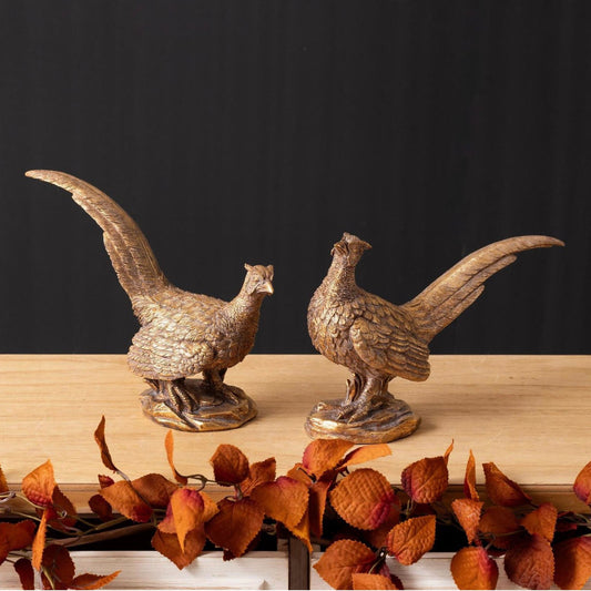 Decorative pheasant figurine, pair shown together