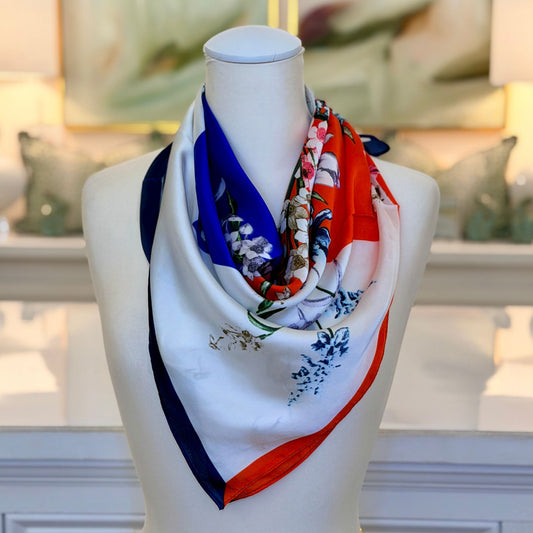 Floral Pattern Scarf in Orange, full view showing colorblock and floral design