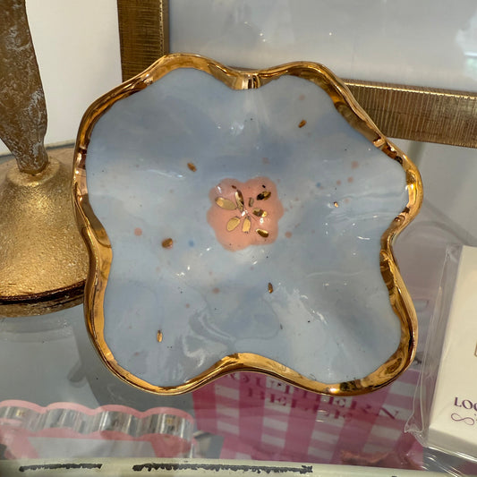 Flower-shaped ceramic dish with scalloped edge and 22k gold luster rim in blue