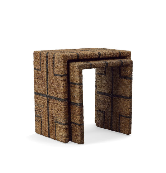 A pair of nesting tables with a mahogany frame and woven banana leaf cord pattern.
