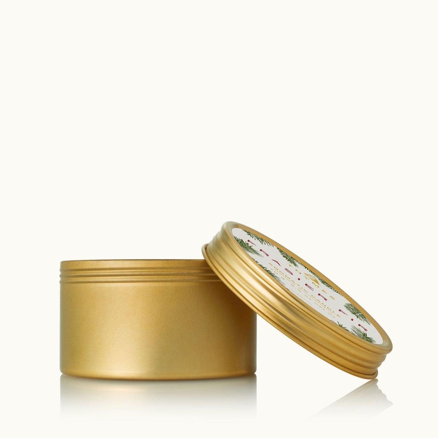 Frasier Fir travel tin candle, lid off showing the wax