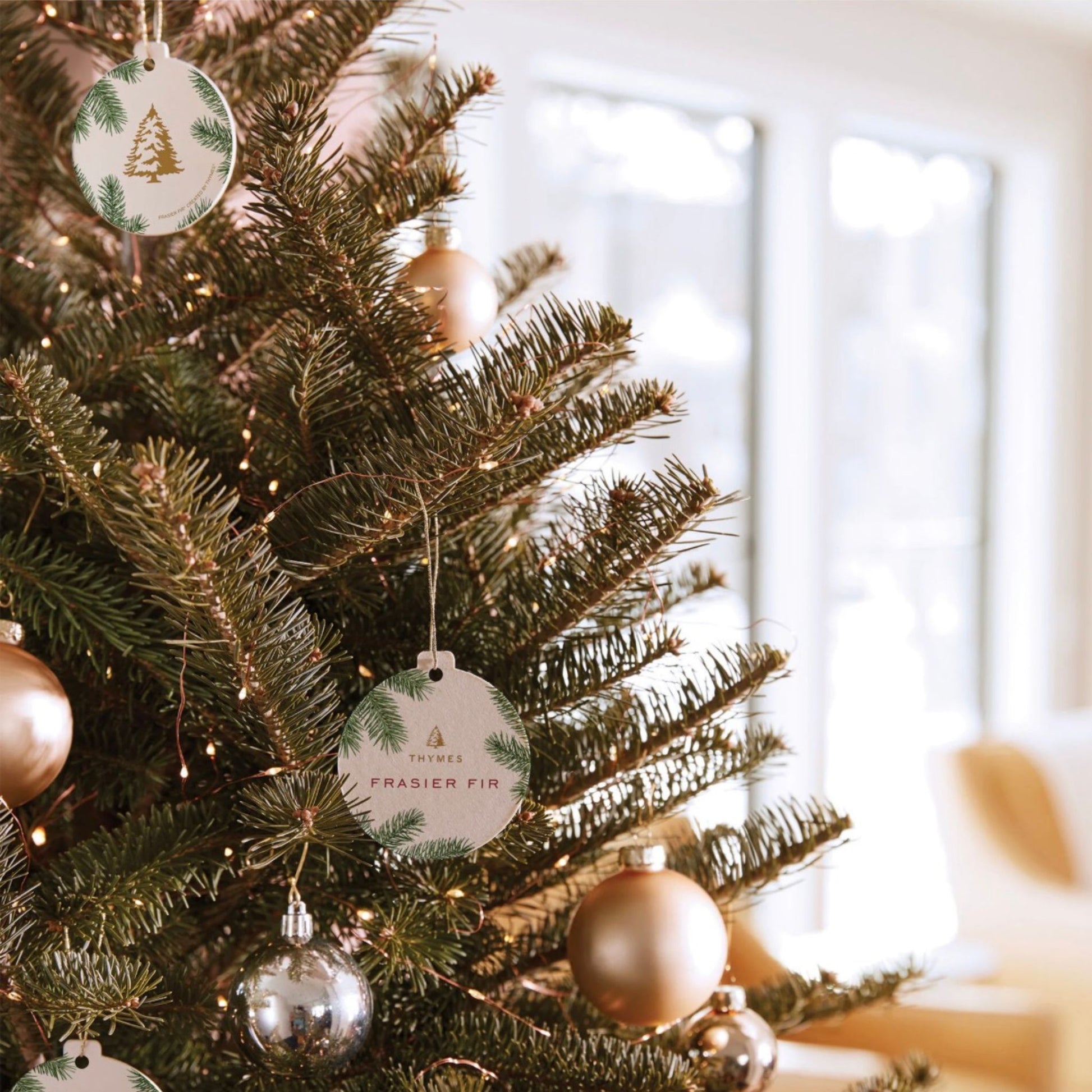 Frasier Fir Decorative Sachet ornament hanging on a beautifully decorated Christmas tree.