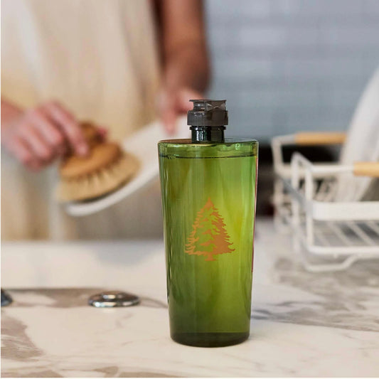 Frasier Fir dishwashing liquid bottle styled on a kitchen counter, lifestyle shot.