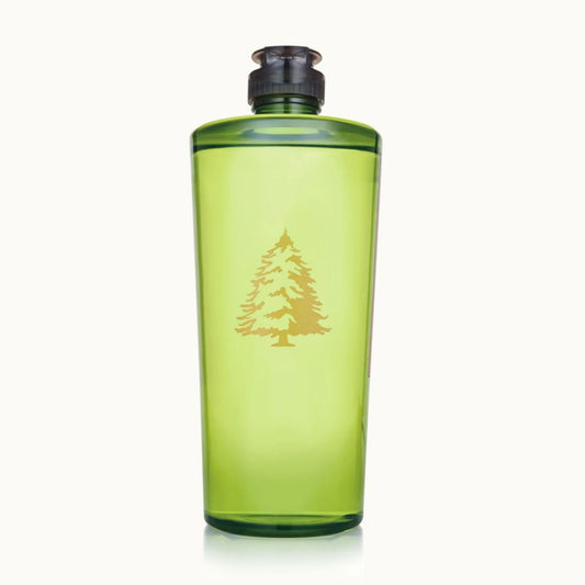 Frasier Fir Dish Soap with Christmas tree emblem on front of green bottle.