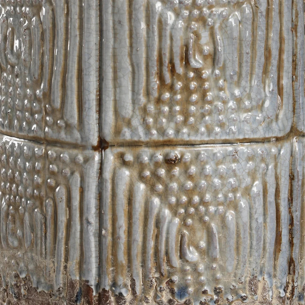 Gray ceramic table lamp with brown patina, close-up of the base