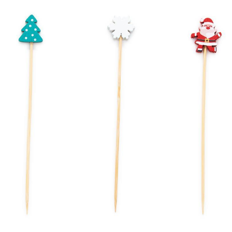 Three Christmas-themed toothpick picks on a white background: a white snowman with a red hat and scarf, a red moose, and a teal tree with white polka dots.