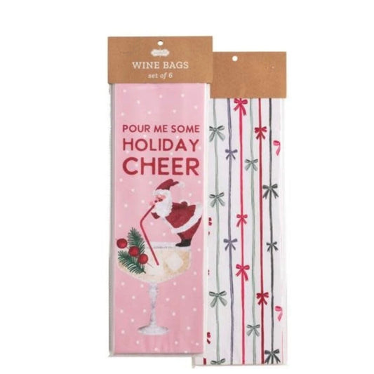 A set of six Christmas-themed wine bags in clear plastic packaging with brown cardboard headers. One bag features a pink background with white polka dots, red text reading 'POUR ME SOME HOLIDAY CHEER,' and an illustration of Santa pouring a drink.