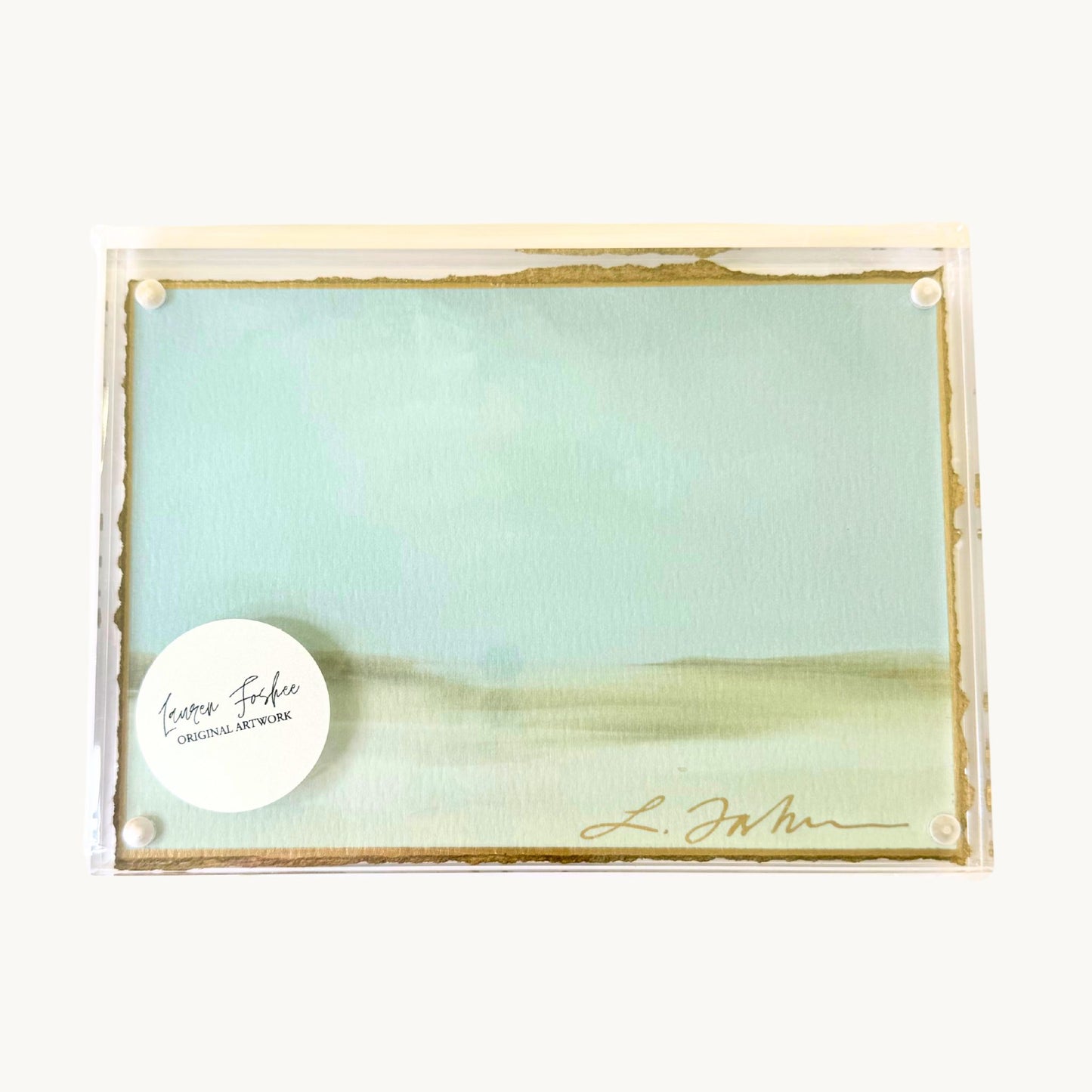 Lauren Foshee signed watercolor print, minimal abstract sky and horizon in soft blue and green tones, in a clear acrylic floating frame