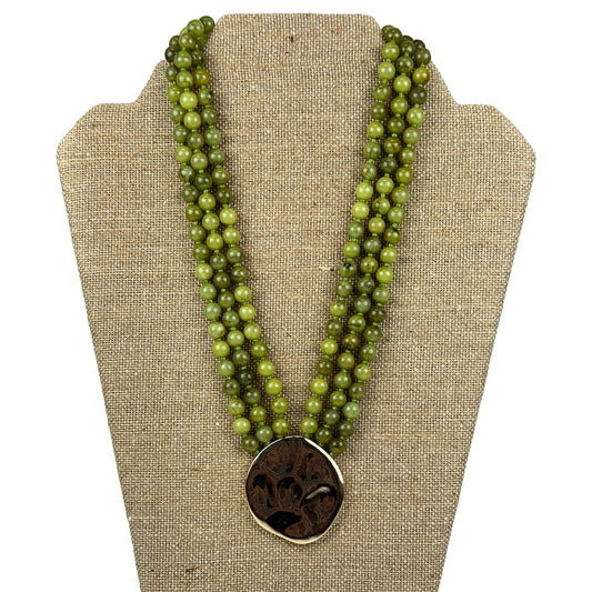 Layered Bead & Marble Necklace in green marbled beads with hammered gold medallion, front view