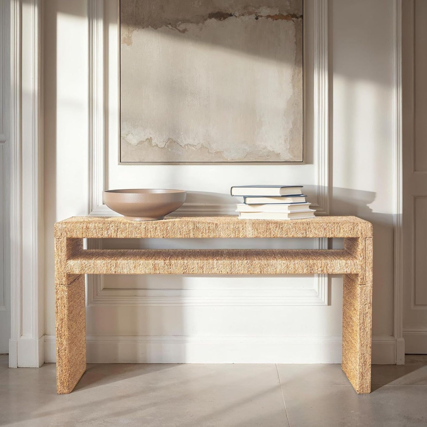 Acacia wood and water hyacinth console table, styled in a room