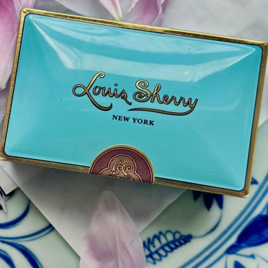 Nile Blue Heritage Caramel Chocolates tin with pink floral styling
