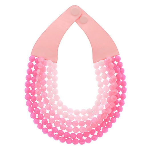 Multi-strand pink bead necklace in graduated shades with ribbon strap