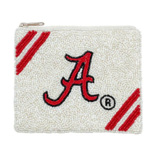 An elephant-shaped coin pouch hand-beaded in Alabama crimson and white, white logo design.