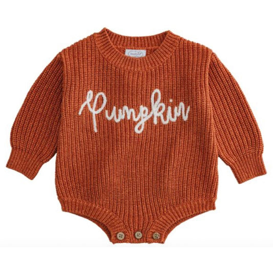 A rust-orange ribbed knit baby bodysuit with 'Pumpkin' written in white script across the chest, shown on a plain white background.