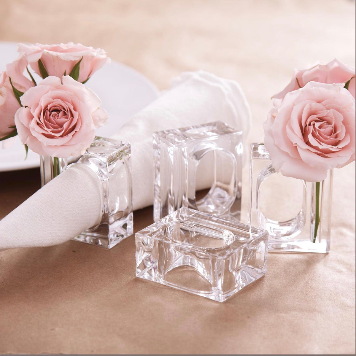 Set of four A La Carte napkin flower vases styled on a table setting