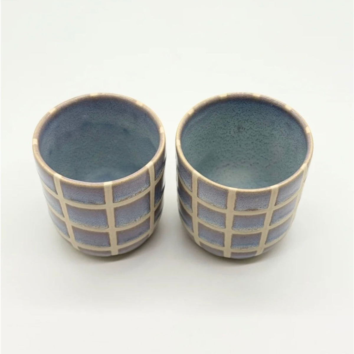 Handmade ceramic juice tumbler in the Daylight glaze, alternate view