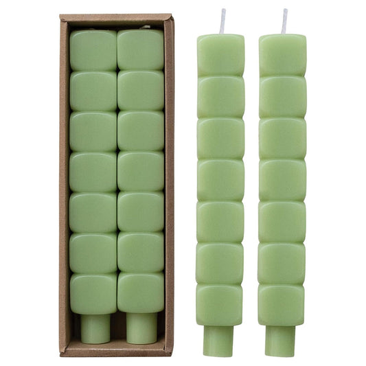 Pair of mint stacked-block taper candles with a sculpted architectural silhouette