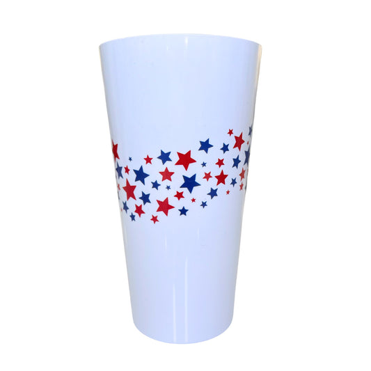 A white tapered plastic cup decorated with a band of red and blue stars around the middle, shown against a plain white background.