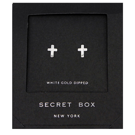 A pair of small silver-tone cross stud earrings displayed in a black gift box.