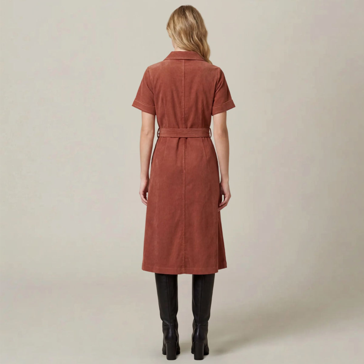 Back view of a terracotta corduroy shirt midi dress.