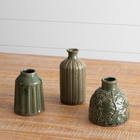 Set of three textured green ceramic vases, Fluted, Chevron, and Vining patterns