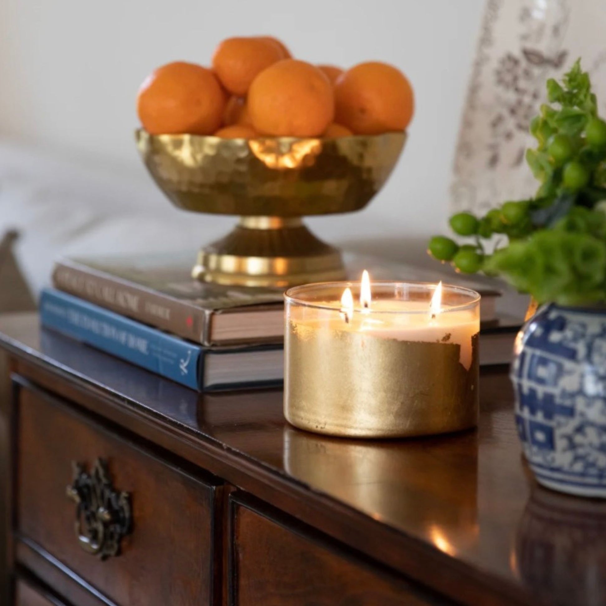 3-Wick Magnolia & Pine Candle with gold leaf glass vessel
