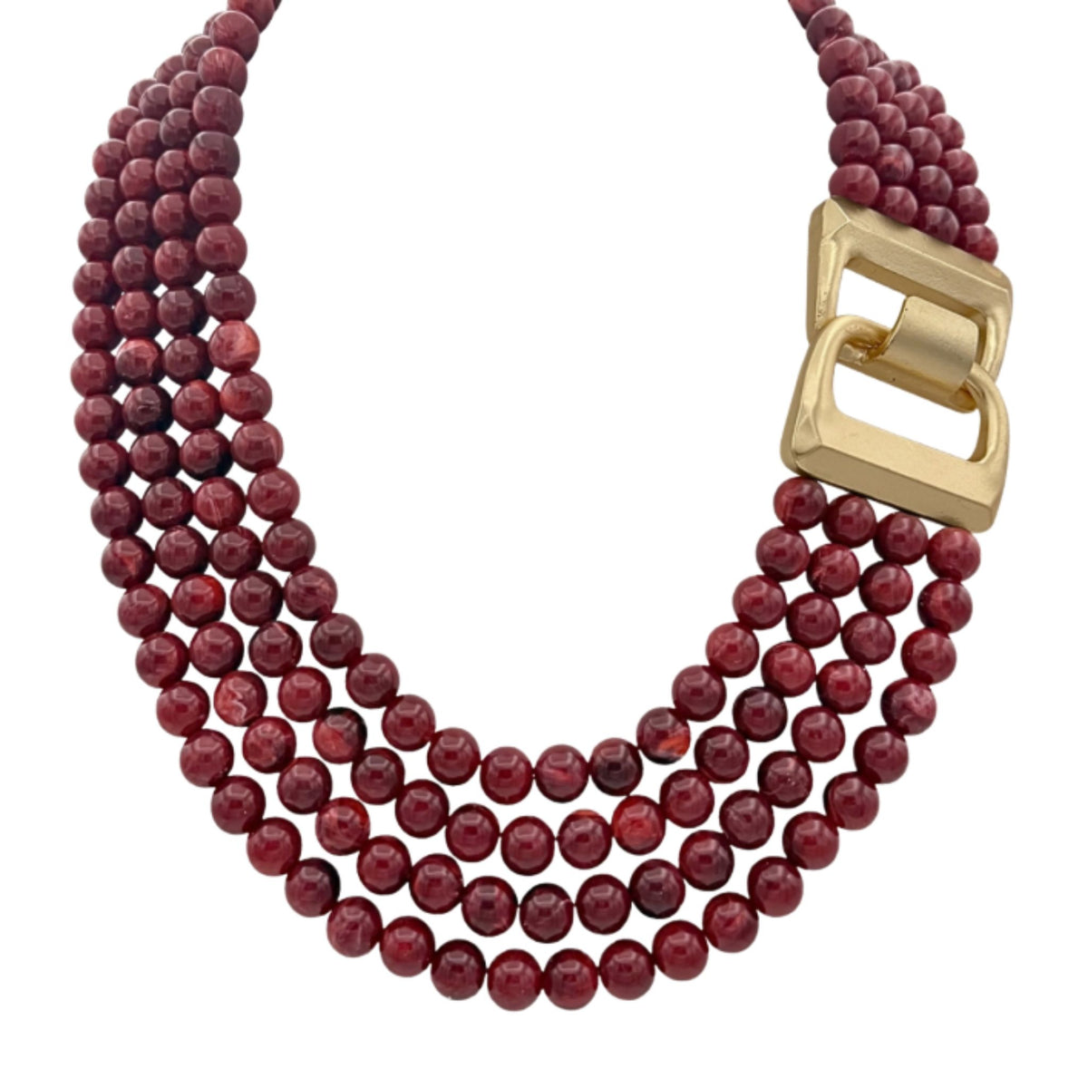 A four-strand burgundy marbled bead necklace with a matte gold buckle-style clasp at the front.
